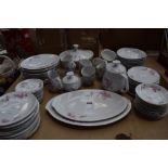 Quantity of white floral decorated china to include plates, saucers, cream jug, sugar pot, tureens