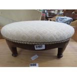 Small oak based fabric topped footstool
