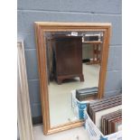 Rectangular gilt framed and bevelled mirror