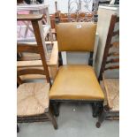 5215 Rexine covered single chair in dark wood