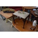 Dark wood piano stool with embroided floral top