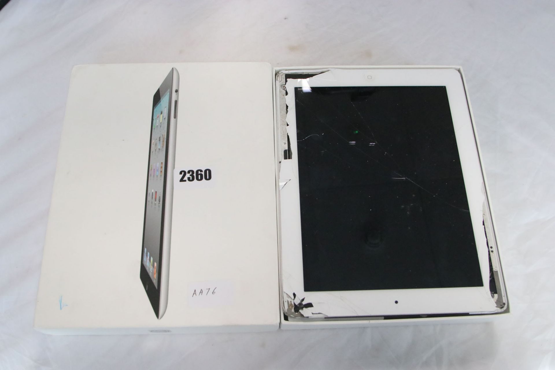 Apple iPad model A1430 16gb (possibly locked to iCloud account, screen and chassis badly smashed,