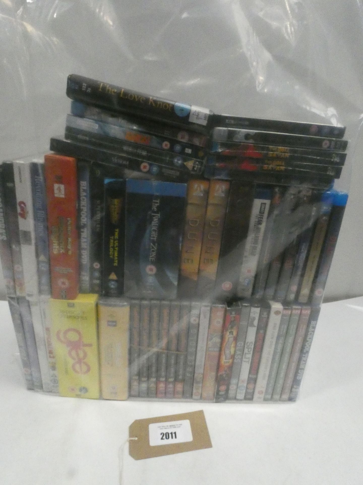 Bag containing quantity of DVD and Blu-Ray films/boxsets