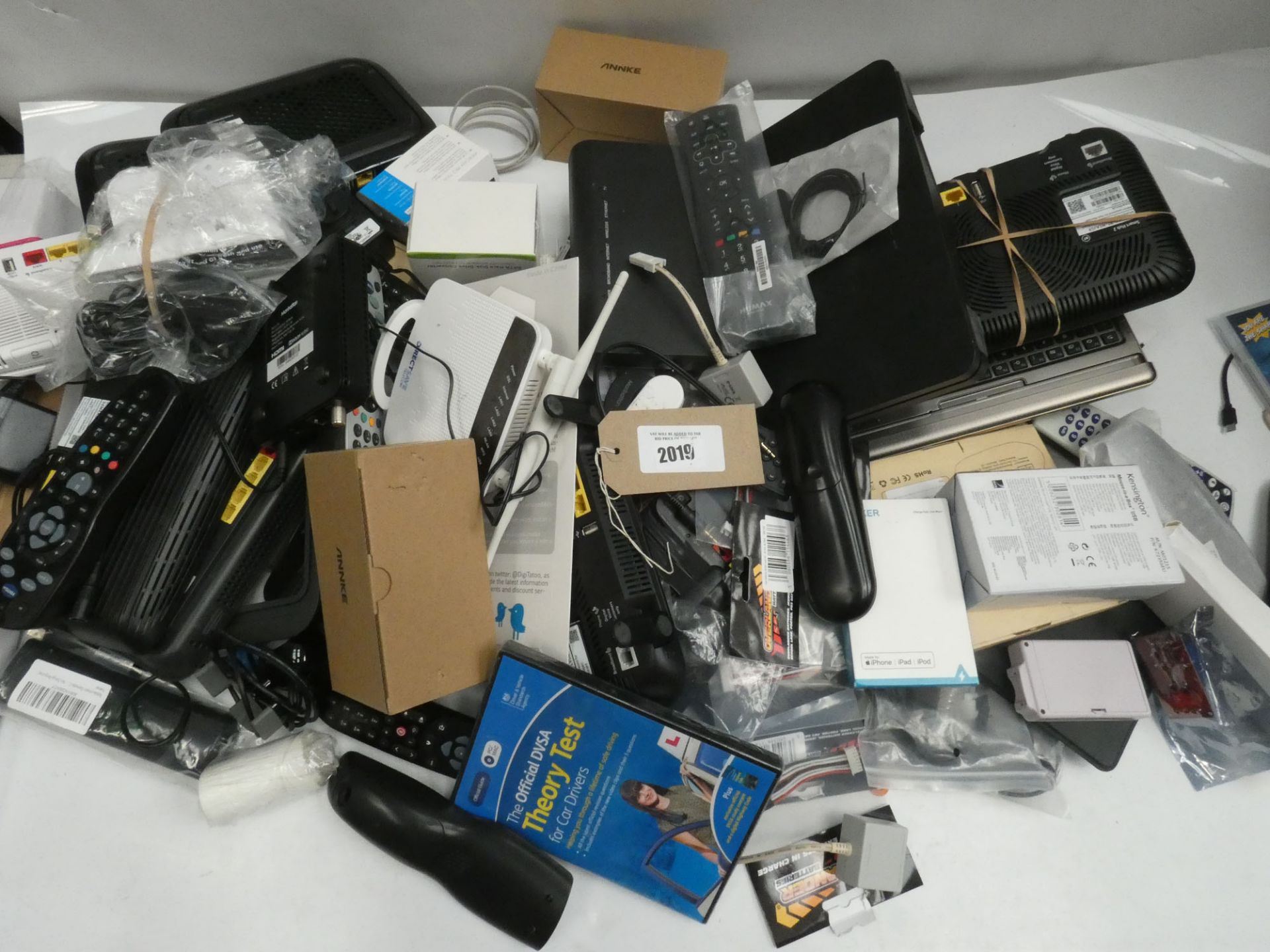 Bag containing assorted electrical accessories/devices; routers, boards, remotes, mice, etc