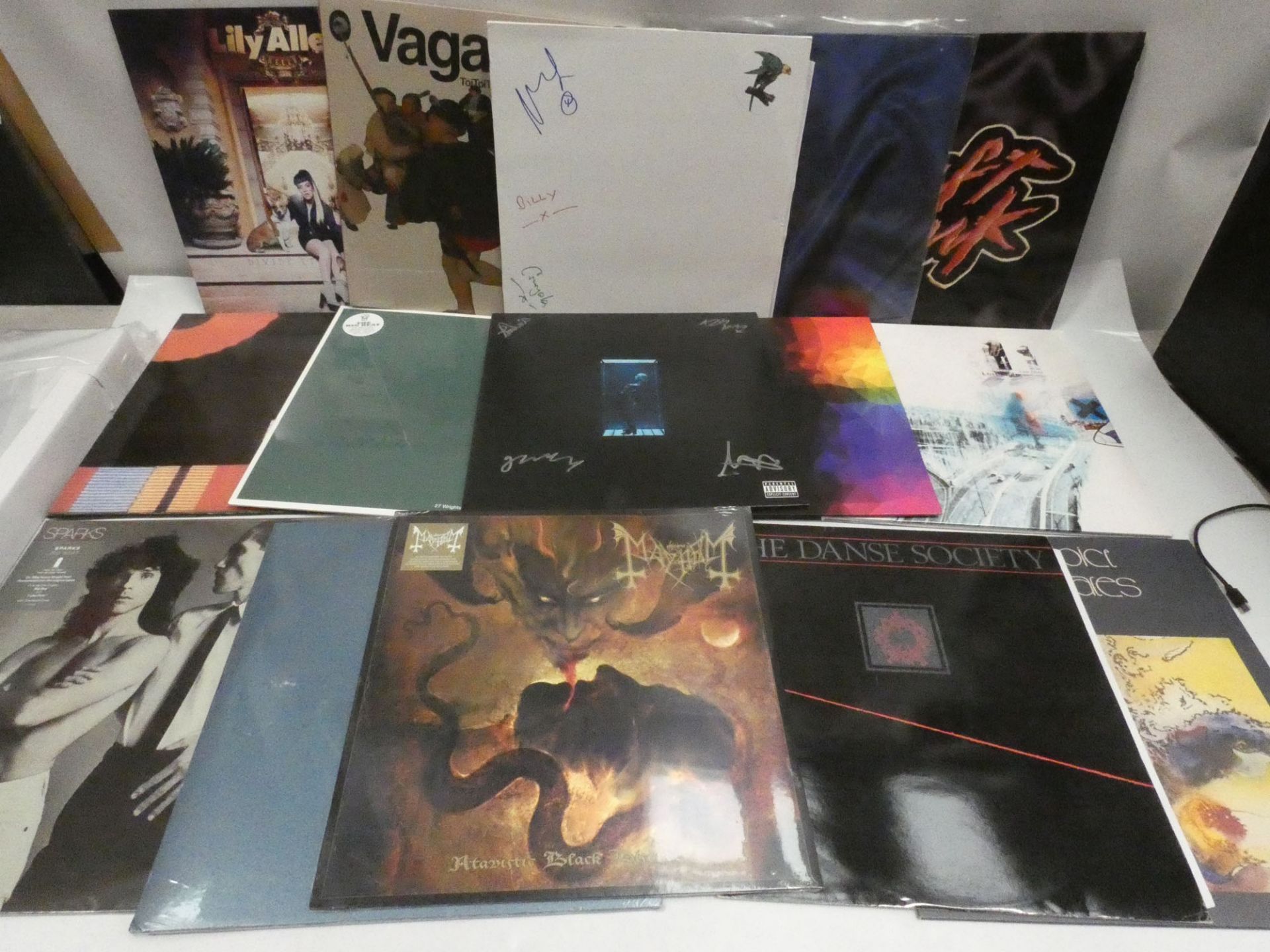 Box containing LP and 45 records to include Radiohead, Daft Punk, Mayhem, Lily Allen and others