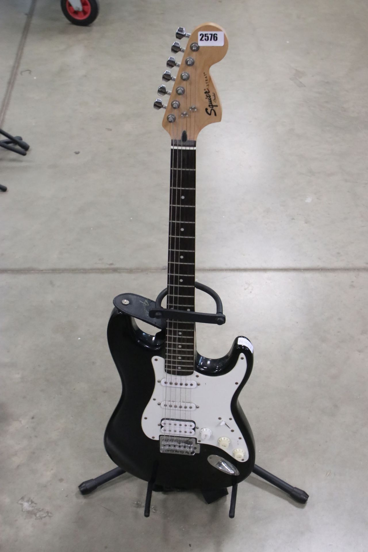 Fender Squire Strat 6-string electric guitar in black and white finish