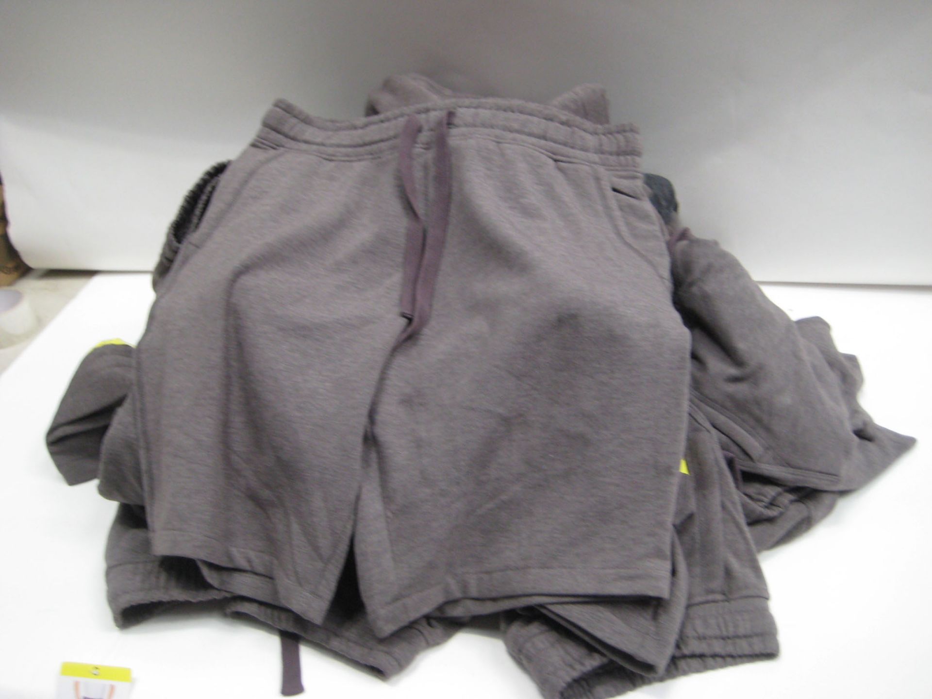 Bag containing approx 25 original Jacks manufacturing company sports shorts in grey