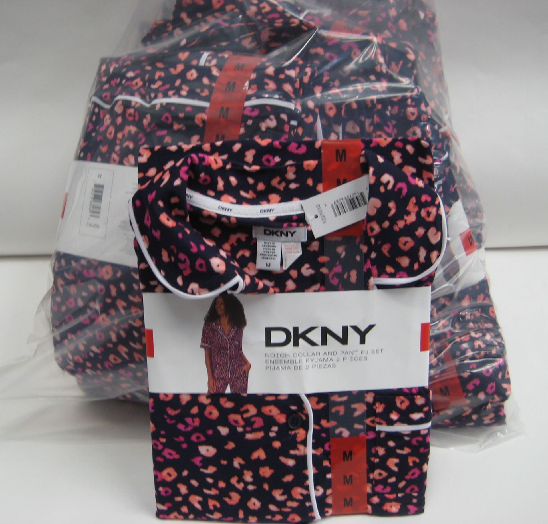 Bag containing approx 15 sets of ladies PJ's by DKNY with floral pink pattern
