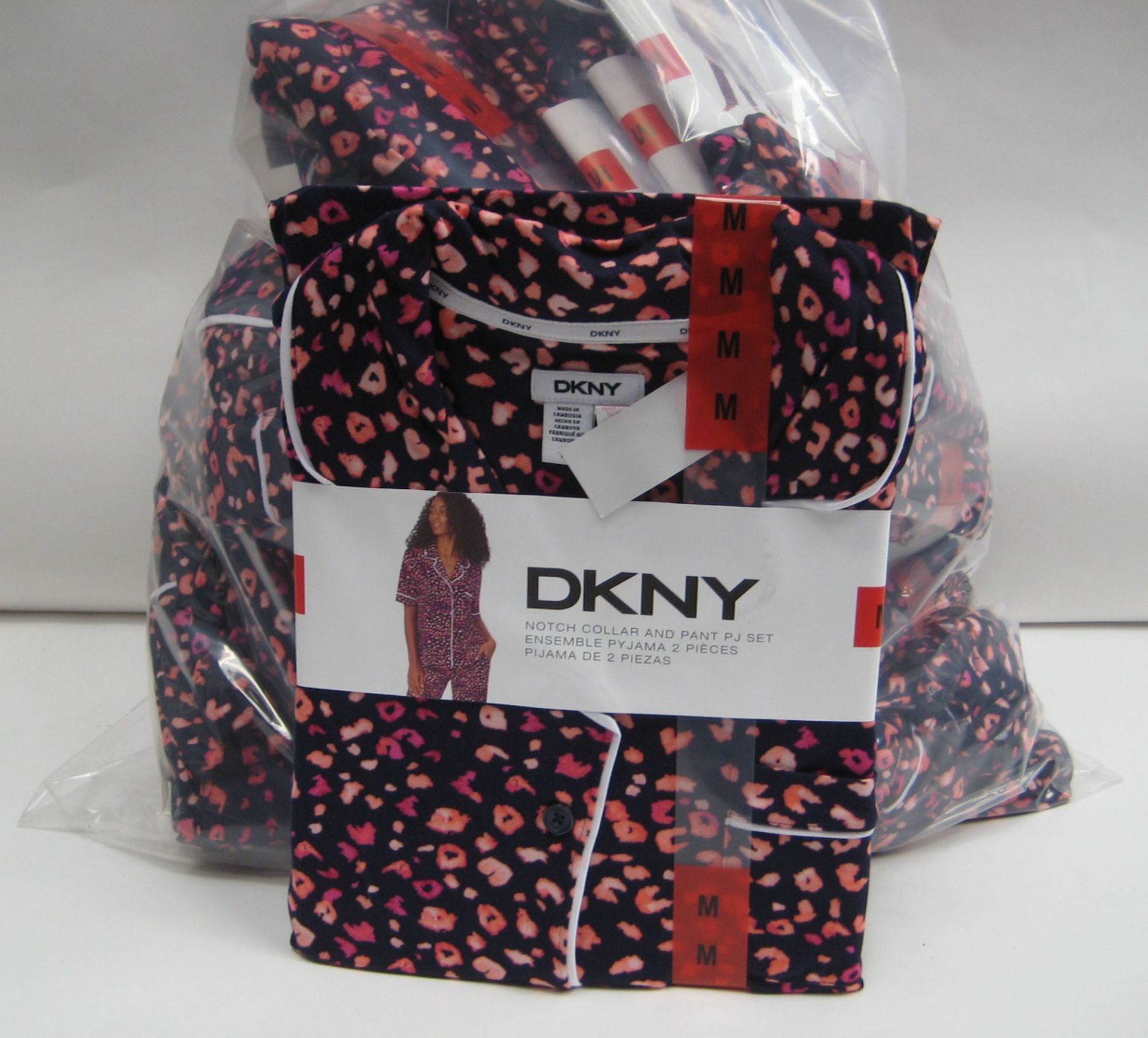 Bag containing approx 15 sets of ladies PJ's by DKNY with floral pink pattern