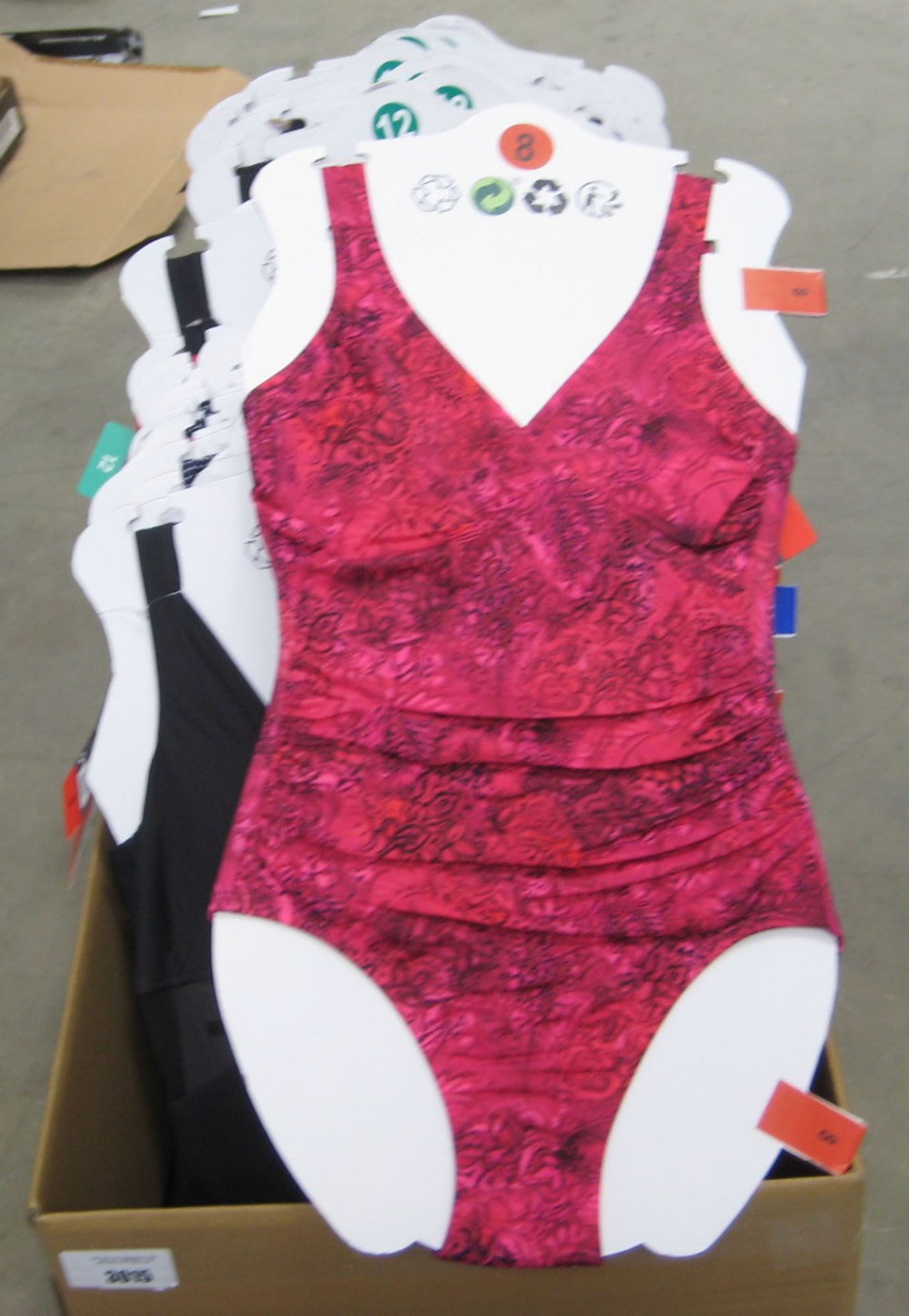 Box containing approx 50 ladies swimsuits by Kirkland sizes 8 - 14 in various colours