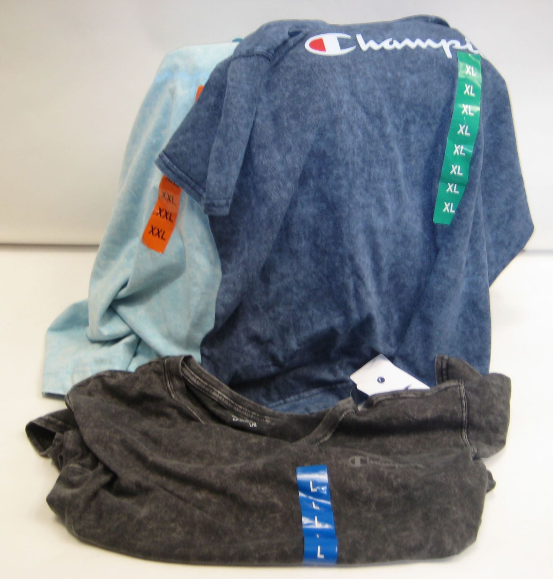 Bag containing approx 30 t shirts by Champion in light blue, dark blue and grey sizes L - XXL