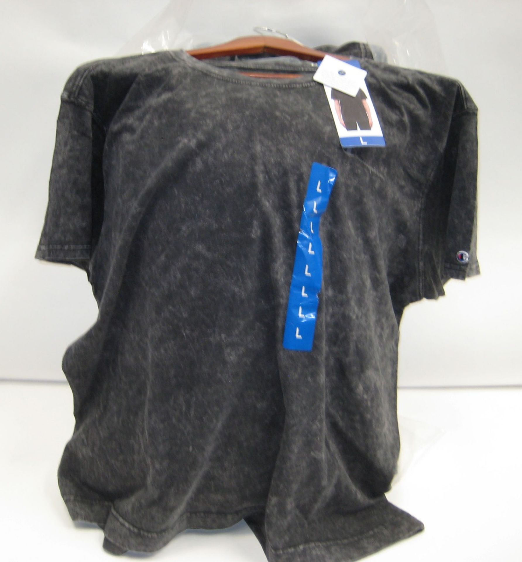 Bag containing approx 50 t shirts by Champion in charcoal sizes M - XL