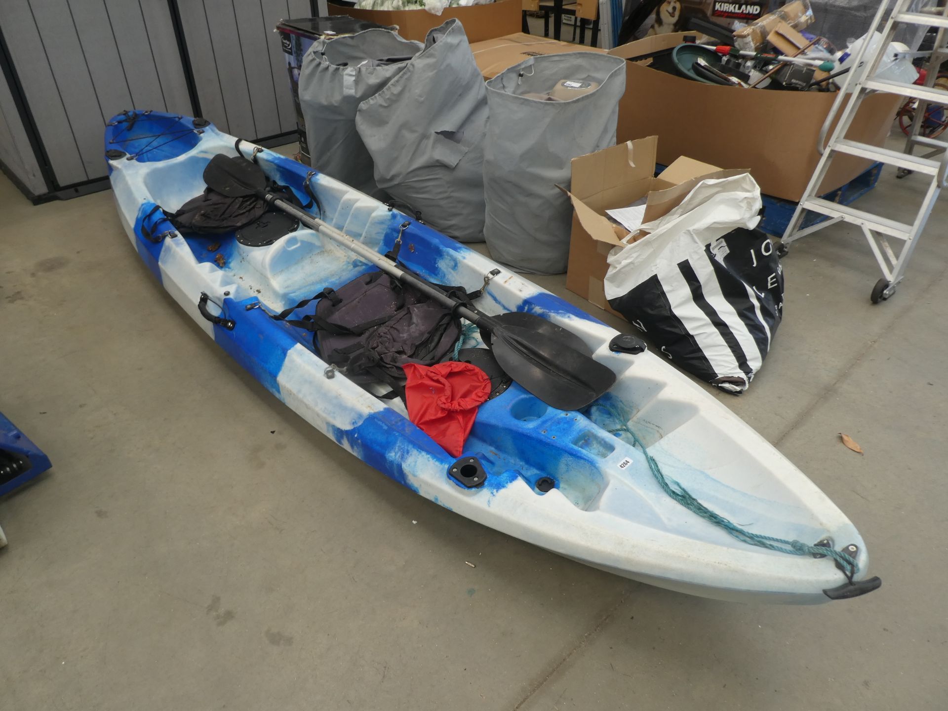 Large 2 berth plastic formed kayak with paddles