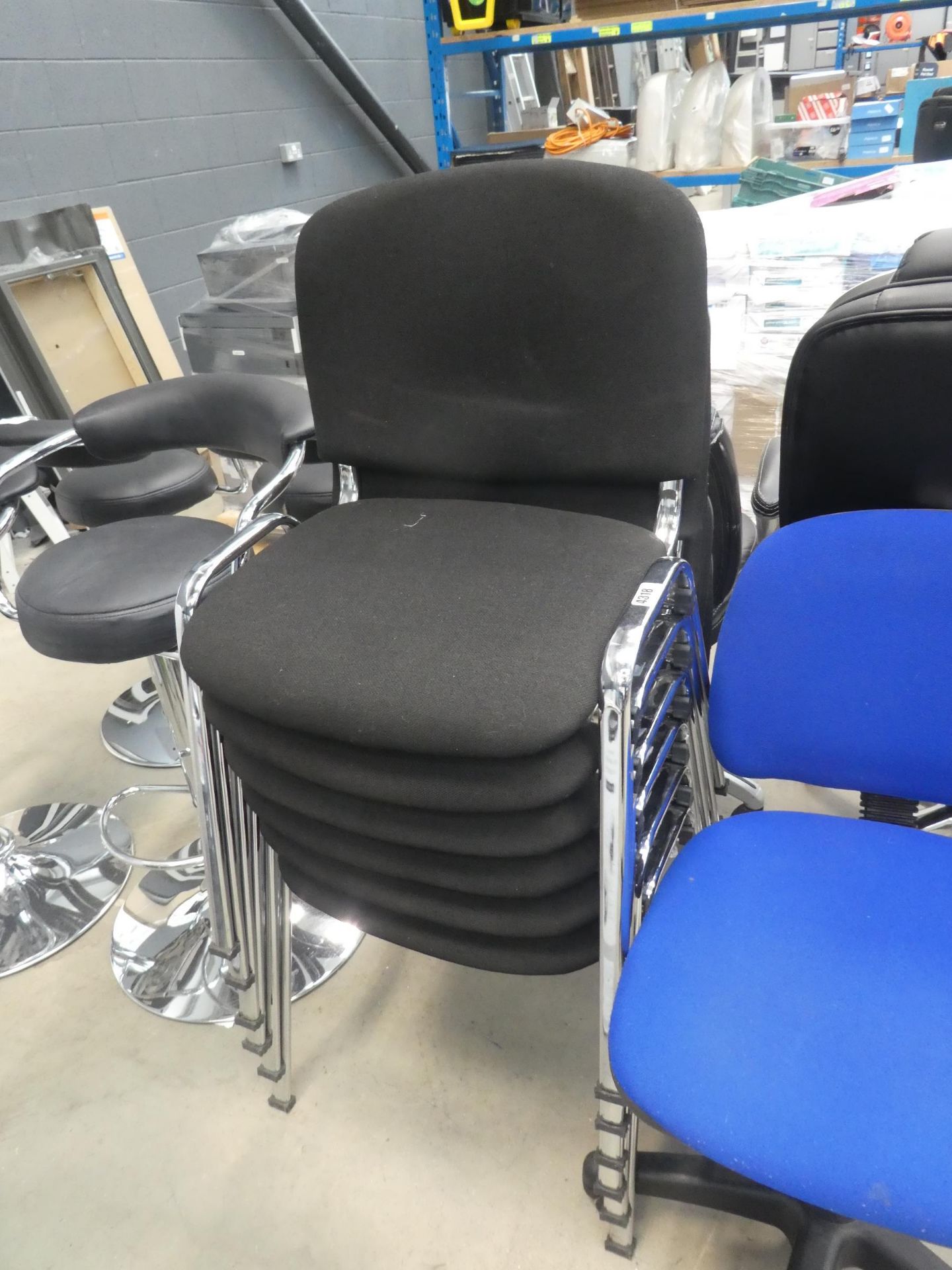 4308 - 6 black cloth stacking chairs on chrome base