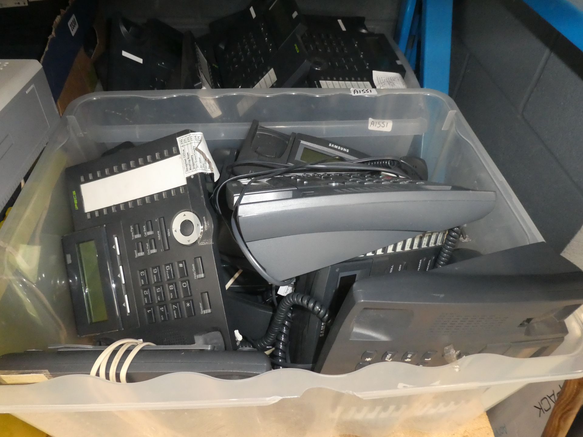 4 boxes containing phone systems