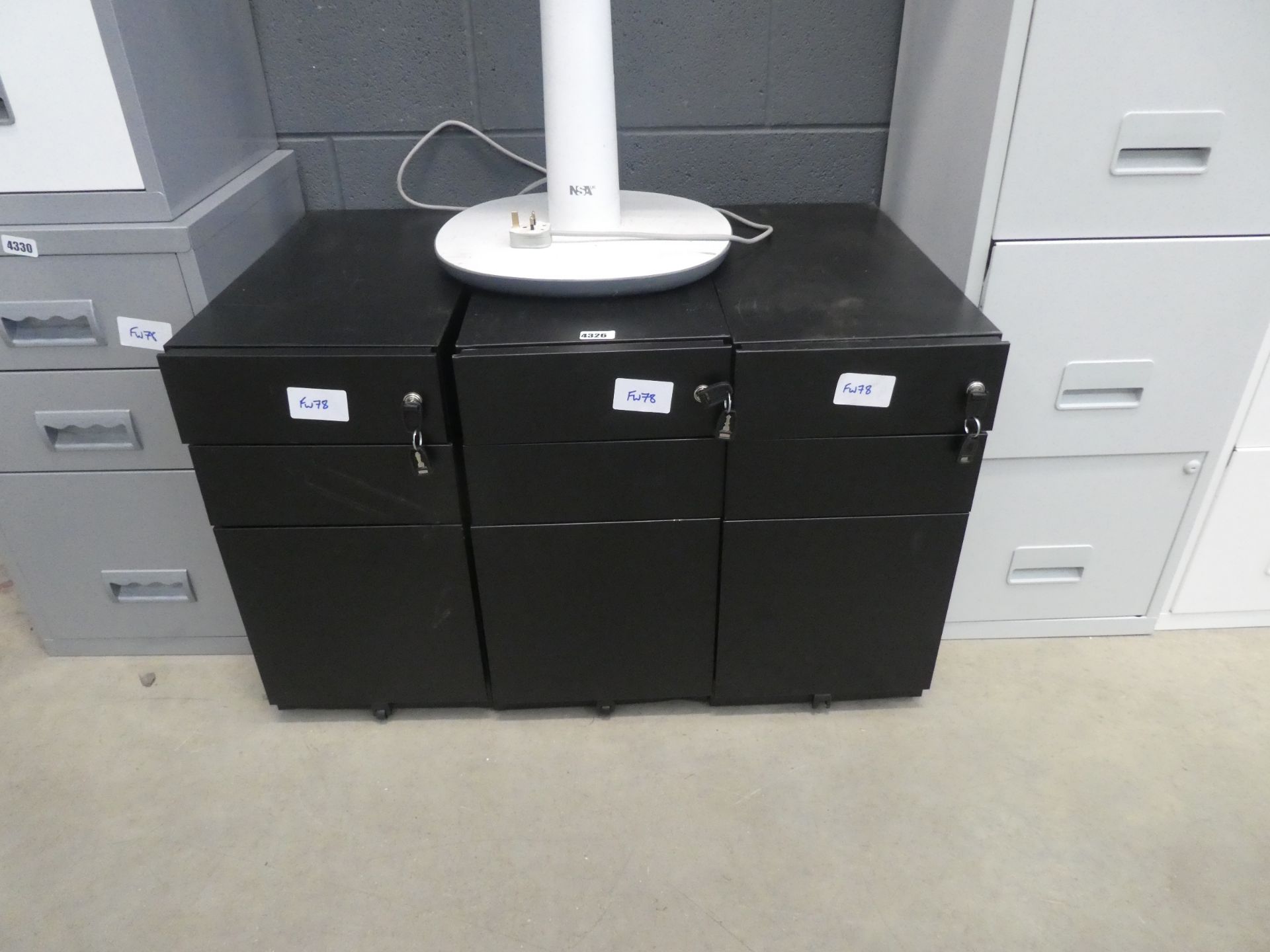 3 under desk mobile pedestals in black