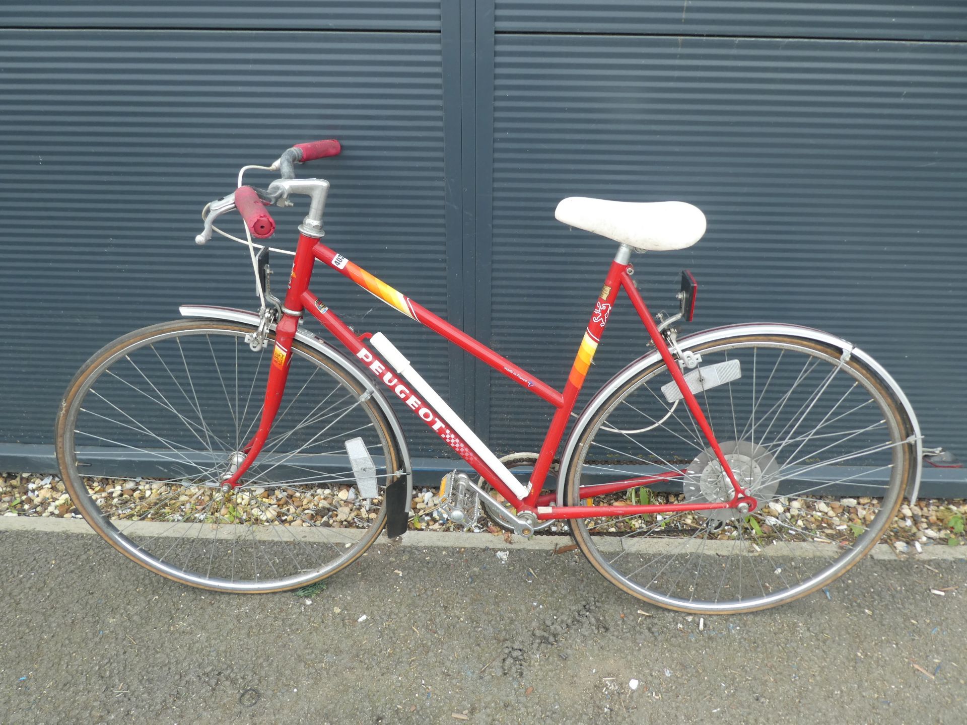 Peugeot bike in red and yellow