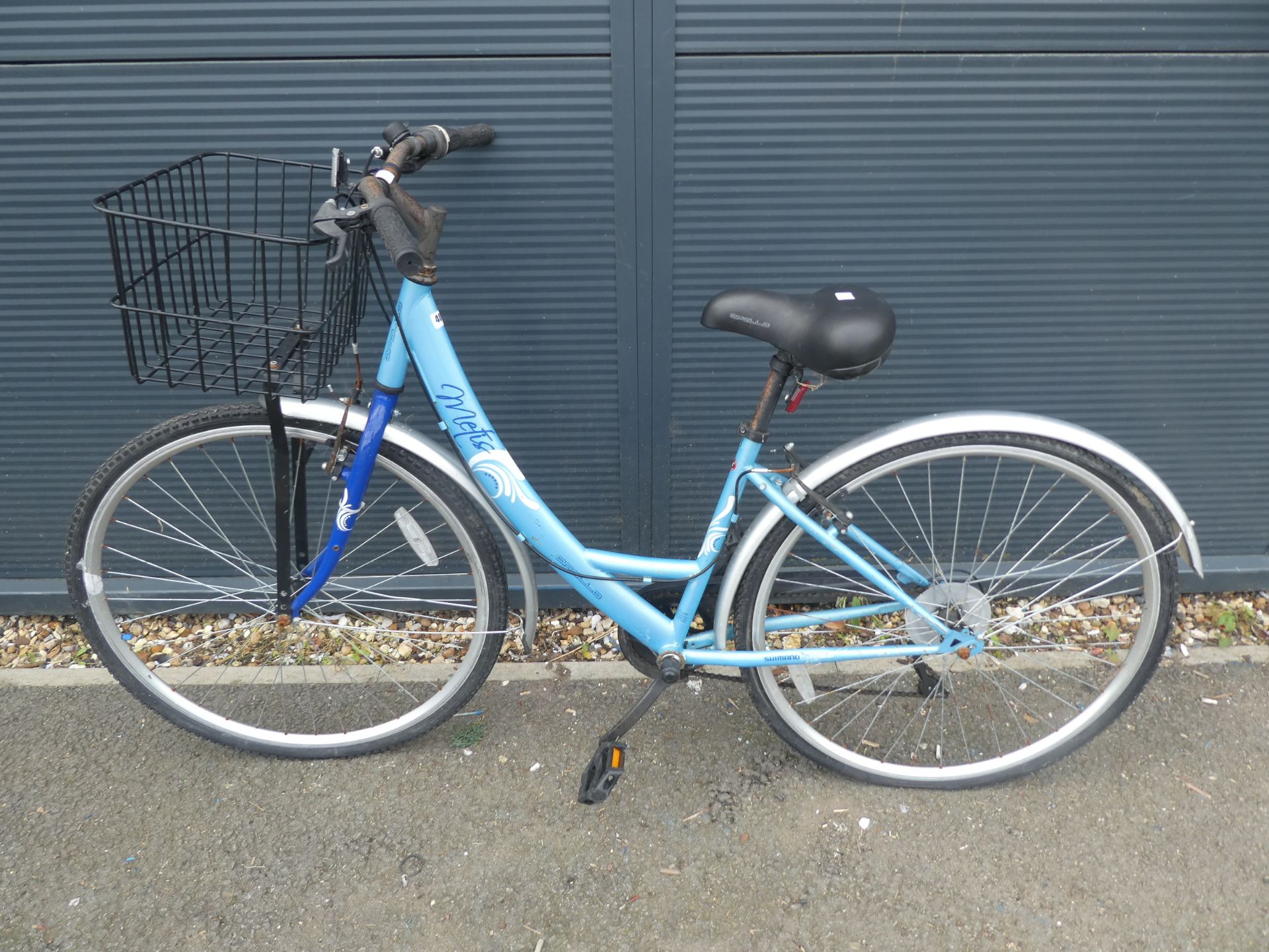 Metis step through bike in blue with shopping basket