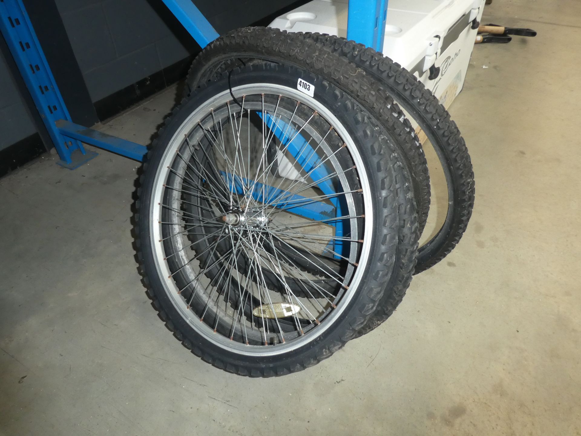 5 bike tyres (2 with wheels)