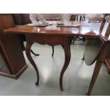 Mahogany folding tea table on cabriole legs