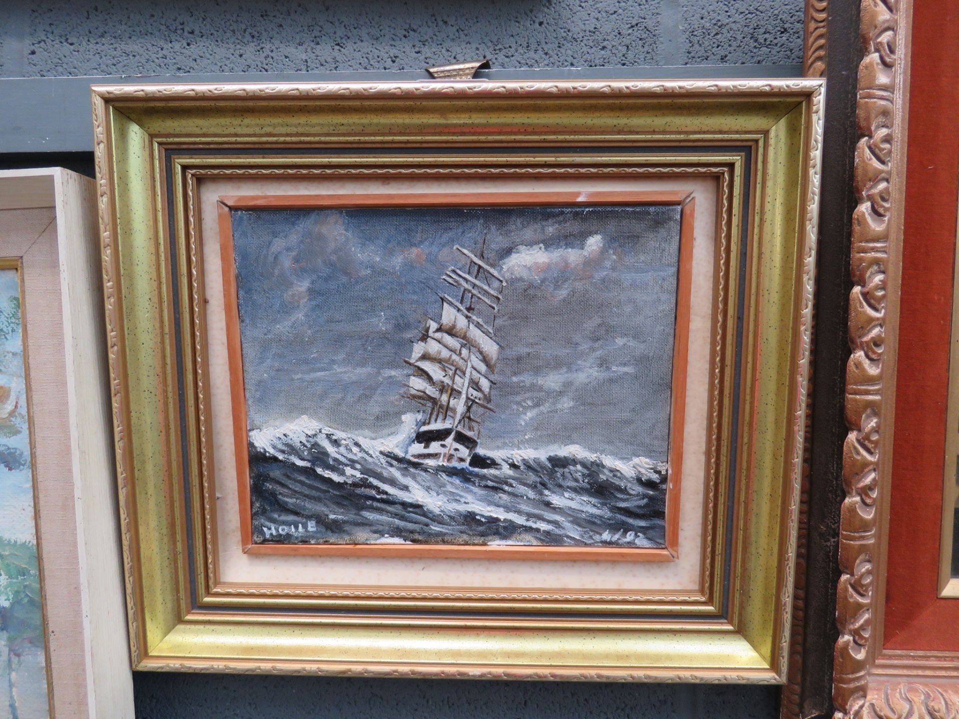 Oil on board of a sailing ship signed 'Holle'