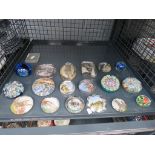 Cage of assorted paperweights