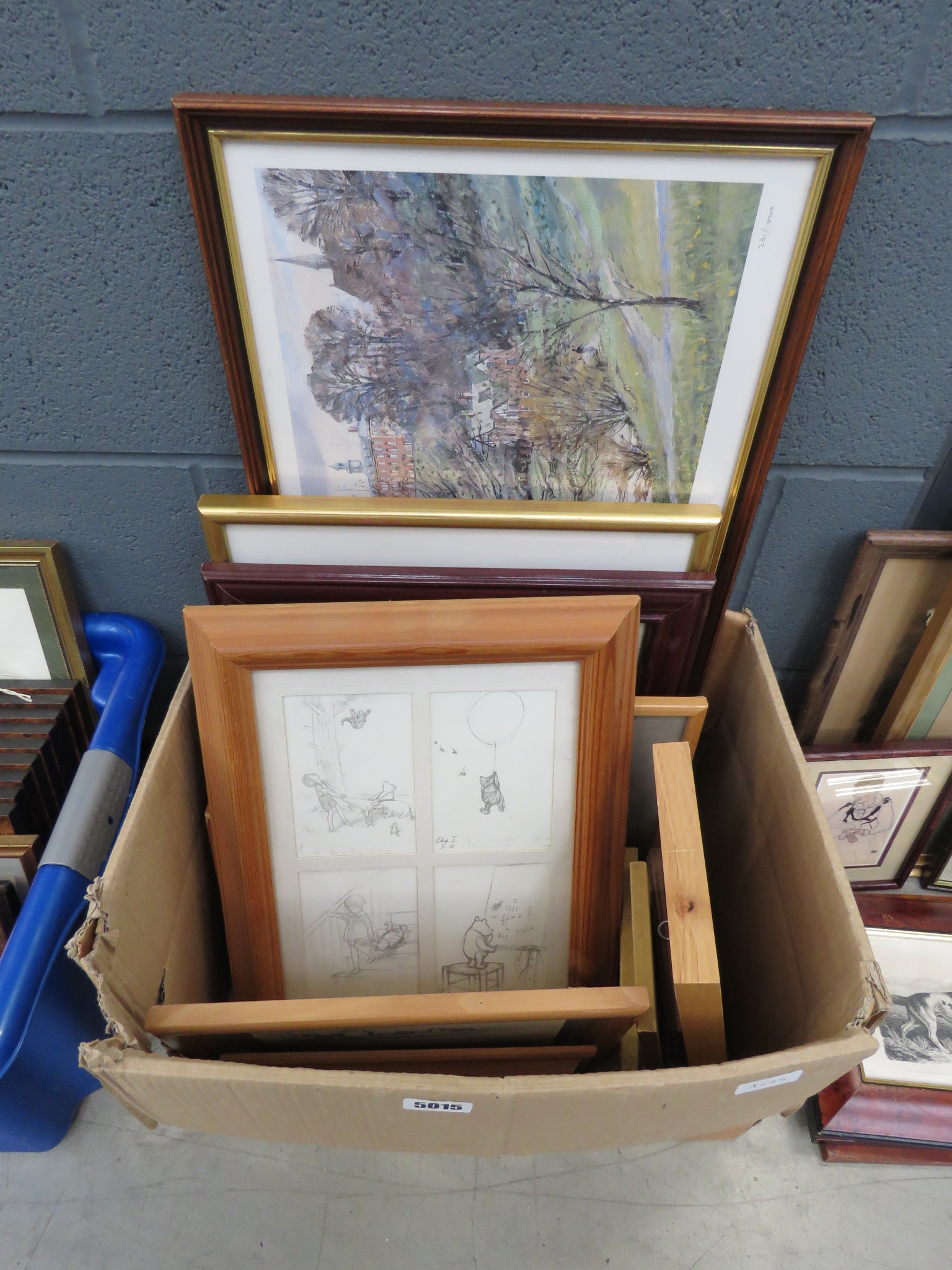 Box of prints etc. including Winnie the Pooh