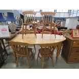 5410 Striped pine oval dining table together with 6 spindle back dining chairs