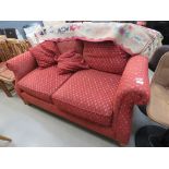 Red 2 seater sofa with diamond decoration