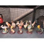 Cage of ornamental bird figurines