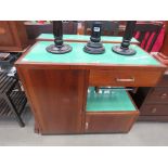 Art Deco style cabinet with green glass top together with a matching side table