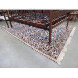 Large carpet with a cream, ground and floral decoration 190x300cm