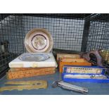 Cage containing commemorative plates, vintage saw, vintage chess set, WWII penknife etc.