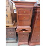 Pair of contemporary mahogany three drawer bedside cabinets by Feather & Black