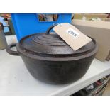 Large cast iron cookware pot and cover