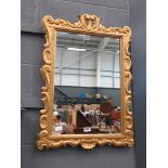 Gilt framed wall mirror