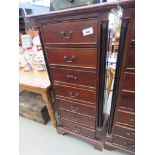 Contemporary mahogany chest of 7 drawers