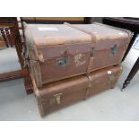 2 wooden bound cabin trunks