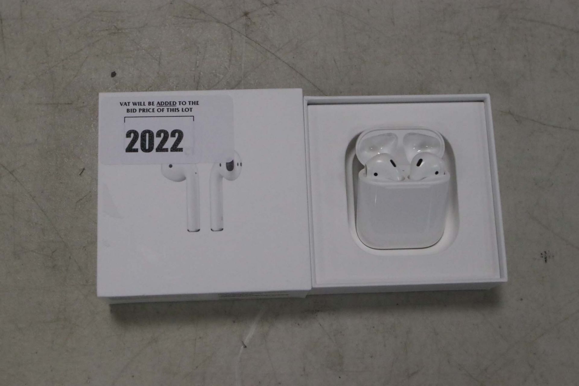 Apple AirPods with charging case and box