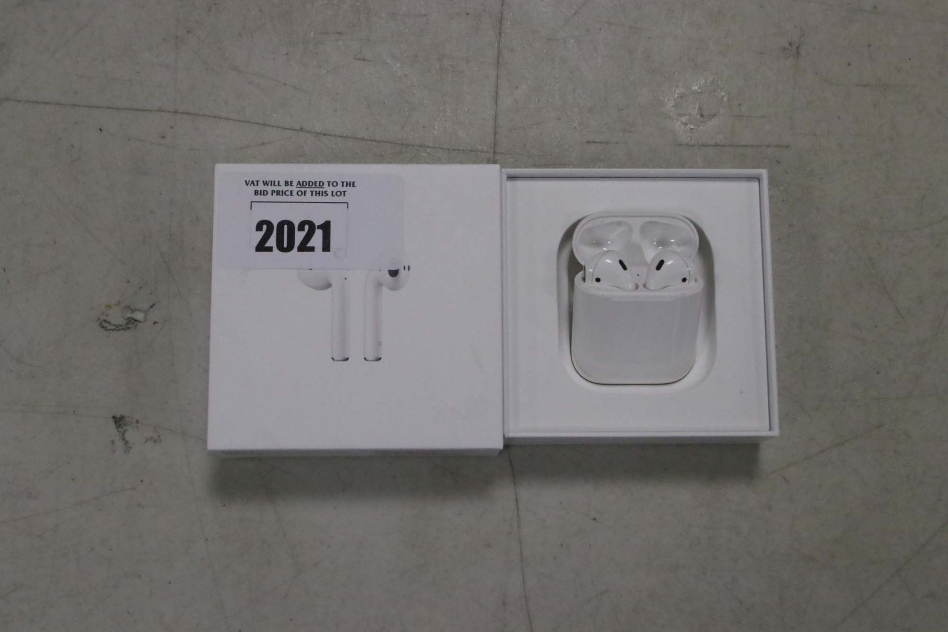 Apple AirPods with charging case and box