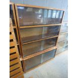 Bookcase with glazed sliding doors in 4 sections