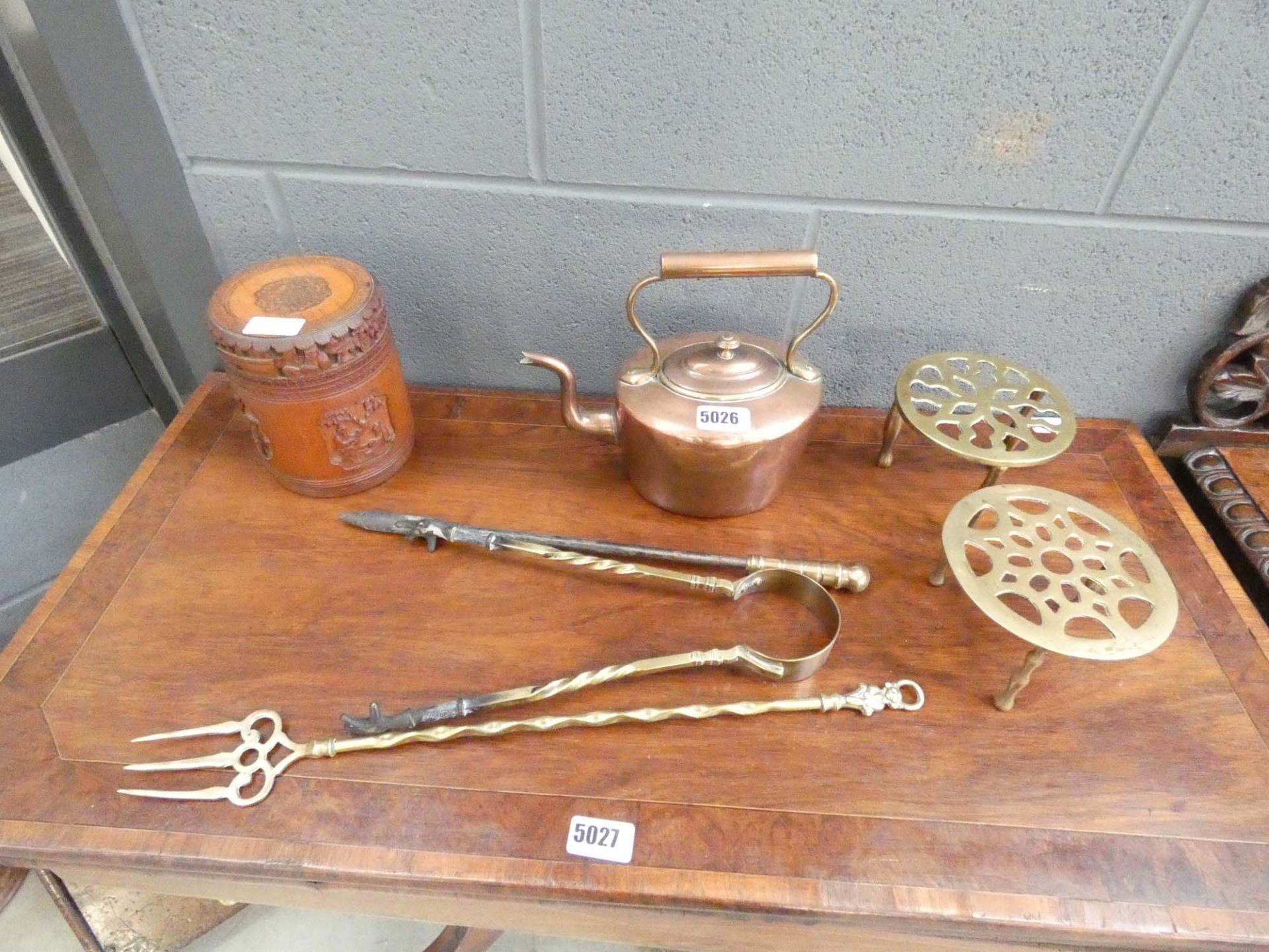 Chinese bamboo brush pot, brass fireside set, pair of trivets, and a copper kettle