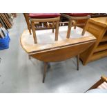 Ercol elm and beech drop leaf dining table