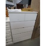 White laminate chest of two over four drawers