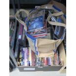 Bag and box of CDs and DVDs