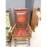 Mahogany and red tooled leather rocking chair