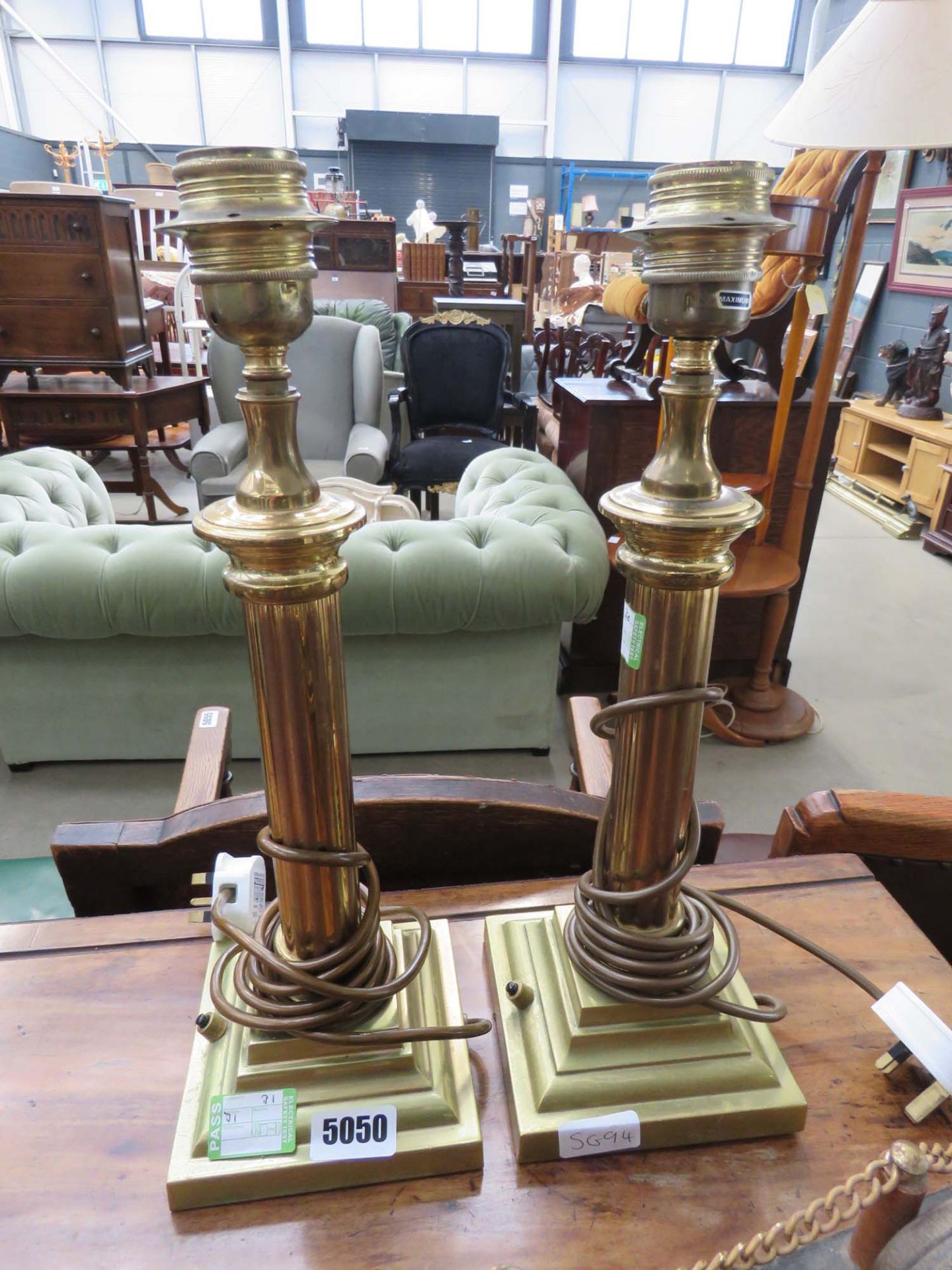 Pair of brass finished Corinthian table lamps