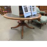 Reproduction walnut and tooled leather circular occasional table