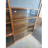 Bookcase with glazed sliding doors in 3 sections