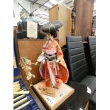 Oriental decorative figure on stand